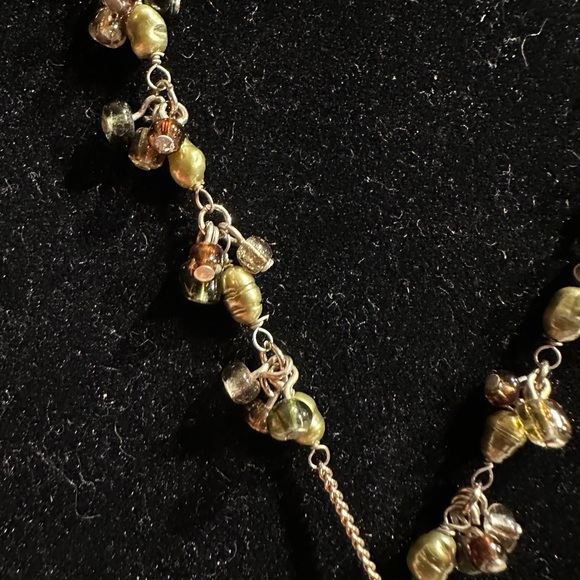 Beautiful amber stone hangs from chain with delicate clusters of small beads. - Picture 3 of 13